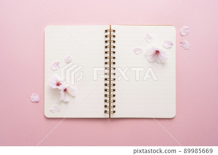 Cherry blossom petals and ring notes Cherry blossom petals and ring notes 89985669