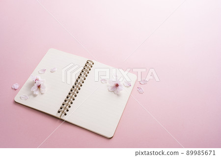 Cherry blossom petals and ring notes Cherry blossom petals and ring notes 89985671