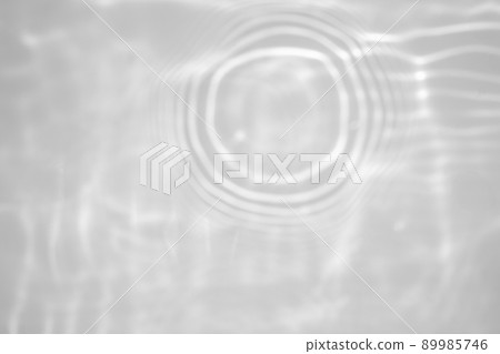 blurred shadow and light caustic effect on a white wall blurred shadow and light caustic effect on a white wall 89985746