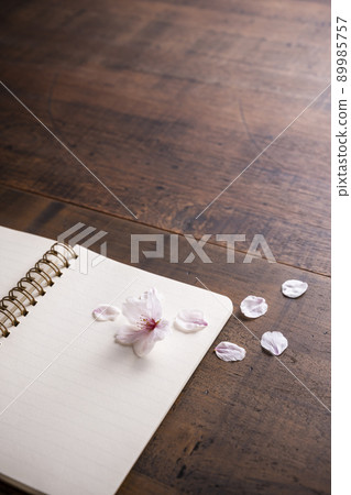 Cherry blossom petals and ring notes 89985757