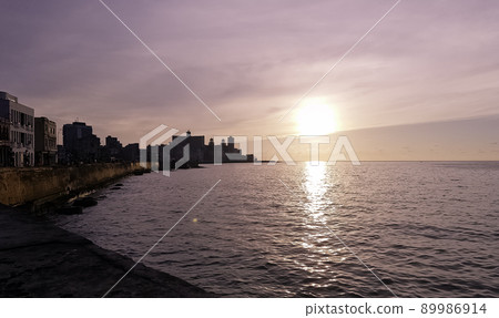 Sunset over Malecon and Atlantic Ocean - Havana 89986914