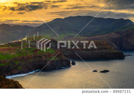 Sunset view of wind turbines for electricity production in Madeira, Portugal Sunset view of wind turbines for electricity production in Madeira, Portugal 89987131