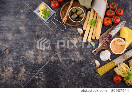 Italian food cooking background with pasta Italian food cooking background with pasta 89987944