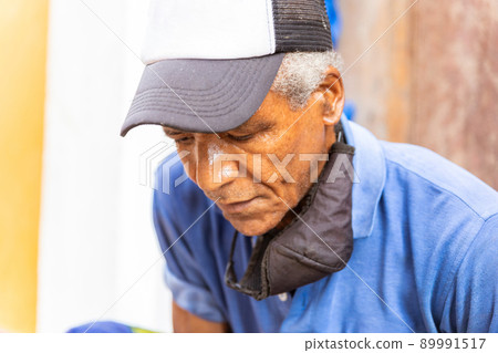 old afro american man sitting outdoors old afro american man sitting outdoors 89991517
