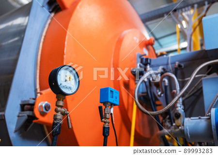 Indicator with orange boiler close-up. Industry and manufacturing Indicator with orange boiler close-up. Industry and manufacturing 89993283