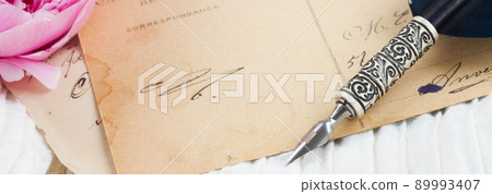 quill pen and antique letters quill pen and antique letters 89993407