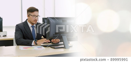 Business people wearing headset working in office broaden view 89995991