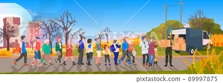 volunteer in military form giving help boxes with Ukraininan flag to refugee humanitarian aid material assistance governmental help volunteer in military form giving help boxes with Ukraininan flag to refugee humanitarian aid material assistance governmental help 89997875