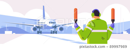 aviation marshaller signaling near aircraft air traffic controller airline worker in signal vest professional airport staff 89997989