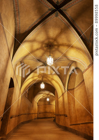 The background of the night-lit medieval Gothic corridor. 89998558