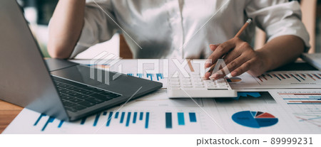 accountant woman working on desk business finance and accounting 89999231