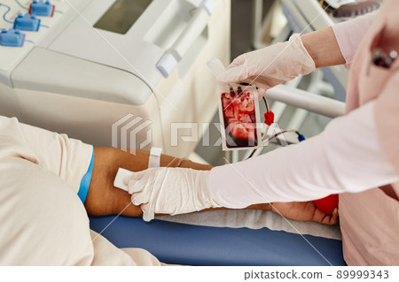 Nurse Working at Blood Donation Center Closeup 89999343