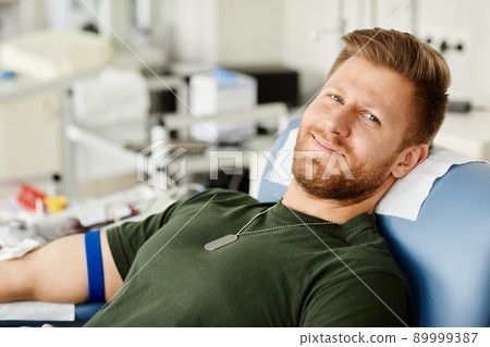Smiling Soldier at Blood Donation Center Smiling Soldier at Blood Donation Center 89999387