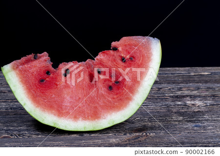 sliced red ripe watermelon during meals 90002166