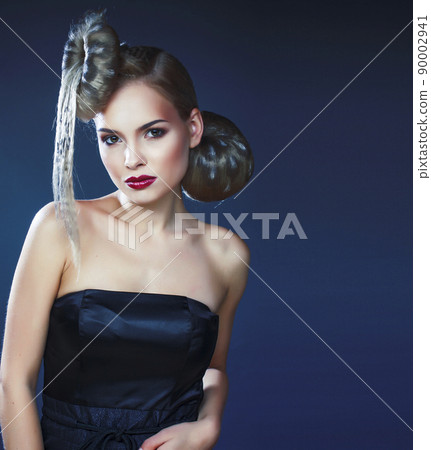 young elegant woman with creative hair style leopard print close up halloween stylish close up young elegant woman with creative hair style leopard print close up halloween stylish close up 90002941