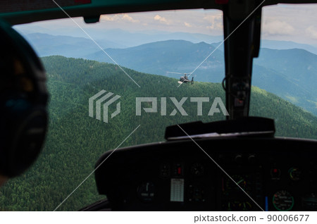 helicopter ride in drmatic deep canyon in the shade. helicopter ride in drmatic deep canyon in the shade. 90006677
