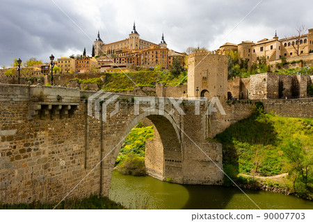 Landscape with a view of the Alcantara Bridge and the Alcazar de Toledo Castle Landscape with a view of the Alcantara Bridge and the Alcazar de Toledo Castle 90007703