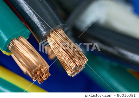 Wire being processed for wiring to a machine 90010381