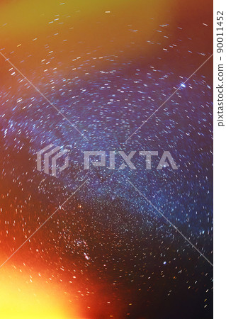 colorful Night Sky Stars Background With Sky Gradient. Rotation Of Starry Sky. Yellow And Magenta Colors. various colours and flare effect 90011452