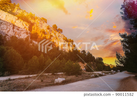 Cassis, Calanques, France. French Riviera. Beautiful Nature Of Cote De Azur On The Azure Coast Of France. Calanques. Altered sunrise Sky 90011582