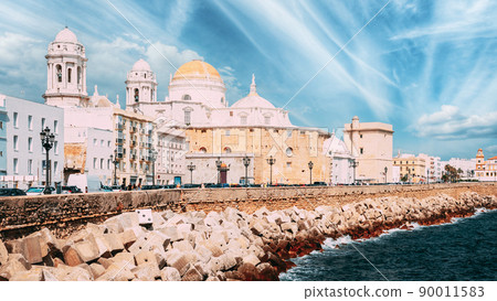 Ancient Cadiz city in southern Spain. Cadiz Cathedral and old town. spain travel. altered sky, 90011583