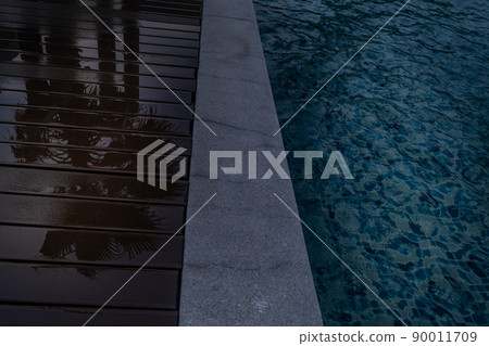 Swimming pool on old wooden Reflections after rainy. Swimming pool on old wooden Reflections after rainy. 90011709
