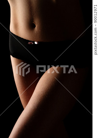 Front view of sexual female body in black panties. Space for text 90012971