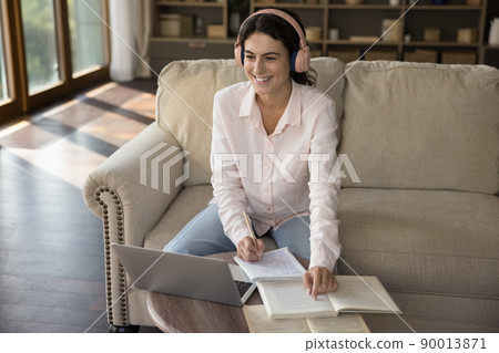 Young student woman studying at home use laptop 90013871
