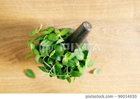 Fresh mint on wooden table. 90014830