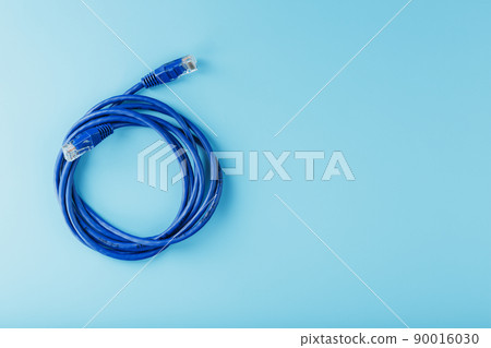 Blue UTP Internet Cable Isolated on a blue background Ethernet Cord 90016030