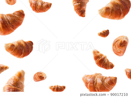 Many fresh baked croissants levitating or flying. Croissants isolated on white background with copy space in the center. Levitation scene. Bakery, confectionery advertisement. Creative breakfast food Many fresh baked croissants levitating or flying. Croissants isolated on white background with copy space in the center. Levitation scene. Bakery, confectionery advertisement. Creative breakfast food 90017210