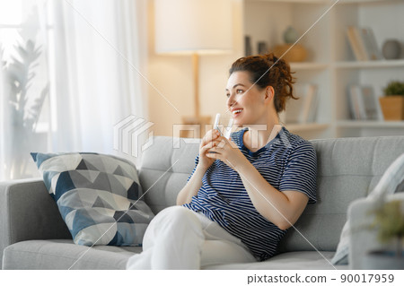 woman drinking pure water 90017959