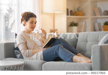 woman reading a book 90017960