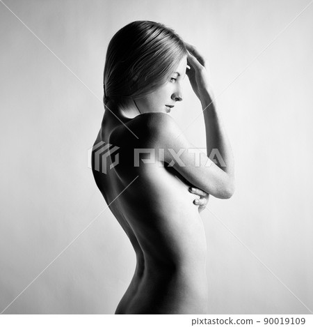 Fashion photo of beautiful nude woman. Black and white Fashion photo of beautiful nude woman. Black and white 90019109