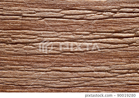 Texture of a wooden surface of beige color close-up 90019280