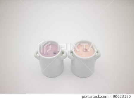 Fruits flavored yogurt with two side-by-side white pottery Fruits flavored yogurt with two side-by-side white pottery 90023150