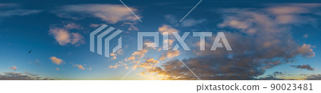 Panorama of a dark blue sunset sky with golden Cumulus clouds. Seamless hdr 360 panorama in spherical equiangular format. Full zenith for 3D visualization, sky replacement for aerial drone panoramas. 90023481