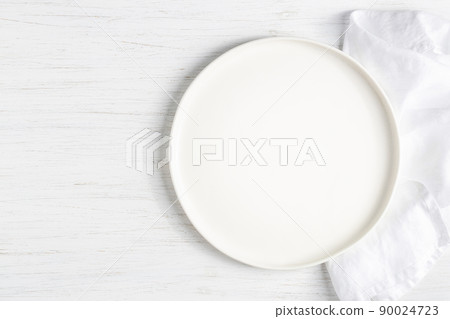 White empty plate and silver cutlery. 90024723