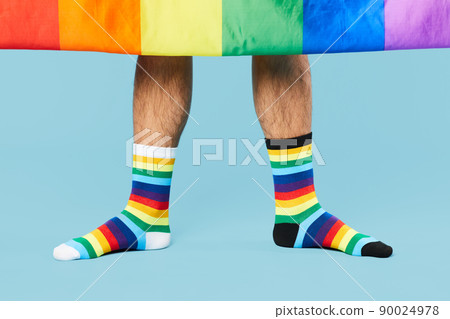 LGBTQ Person Wearing Playful Socks 90024978