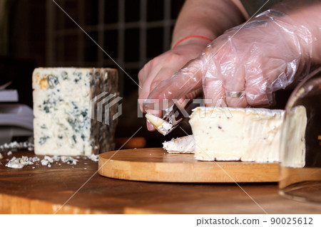 Cheese shop. Roquefort. Selective focus. Close up. Cheese shop. Roquefort. Selective focus. Close up. 90025612