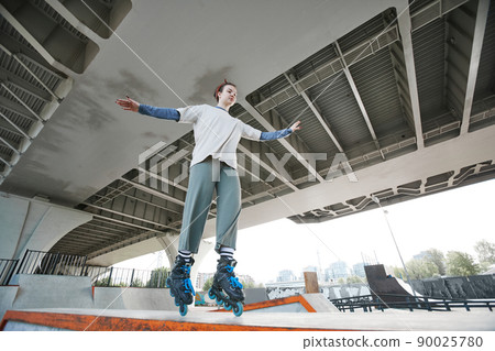 Teenage Girl Inline Skating 90025780