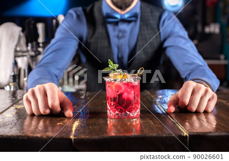 Barman mixes a cocktail on the public house Barman mixes a cocktail on the public house 90026601