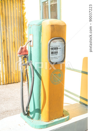 gas station pumps. Old Vintage technology Fuel Dispenser fossil fuel energy for car vehicle transportation. 90037223