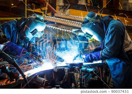 worker with protective mask welding metal worker with protective mask welding metal 90037431