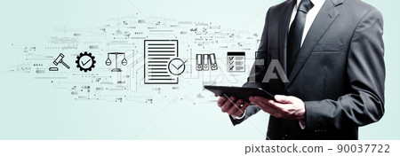 Compliance concept with businessman holding a tablet 90037722