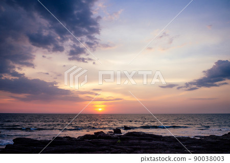 Sunset in Ashvem beach, Goa, India Sunset in Ashvem beach, Goa, India 90038003