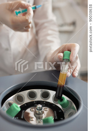 Platelet-Rich plasma preparation. Plasma in syringe. Centrifuge. 90038638