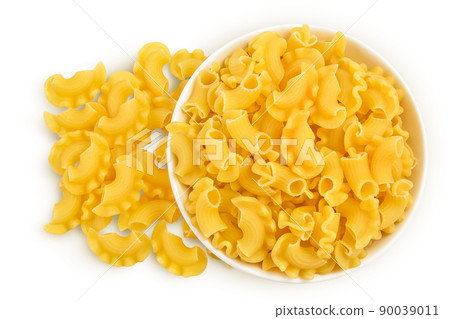 Pasta cornetti creste macaroni in bowl isolated on white background with clipping path and full depth of field. Top view. Flat lay Pasta cornetti creste macaroni in bowl isolated on white background with clipping path and full depth of field. Top view. Flat lay 90039011