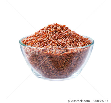 red rice in a clear glass bowl isolated on white background. red rice in a clear glass bowl isolated on white background. 90039284