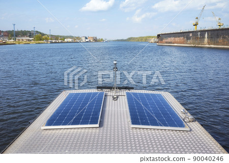 Photovoltaic panels installed on a boat roof. 90040246
